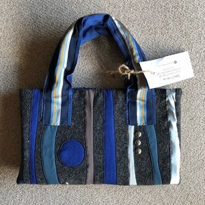 KennaKristine eco friendly art appliqué clutch